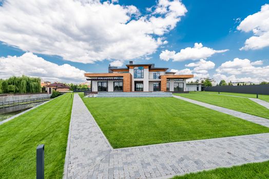 A well-maintained residential lawn in the Indianapolis area with a fresh cut stripe pattern